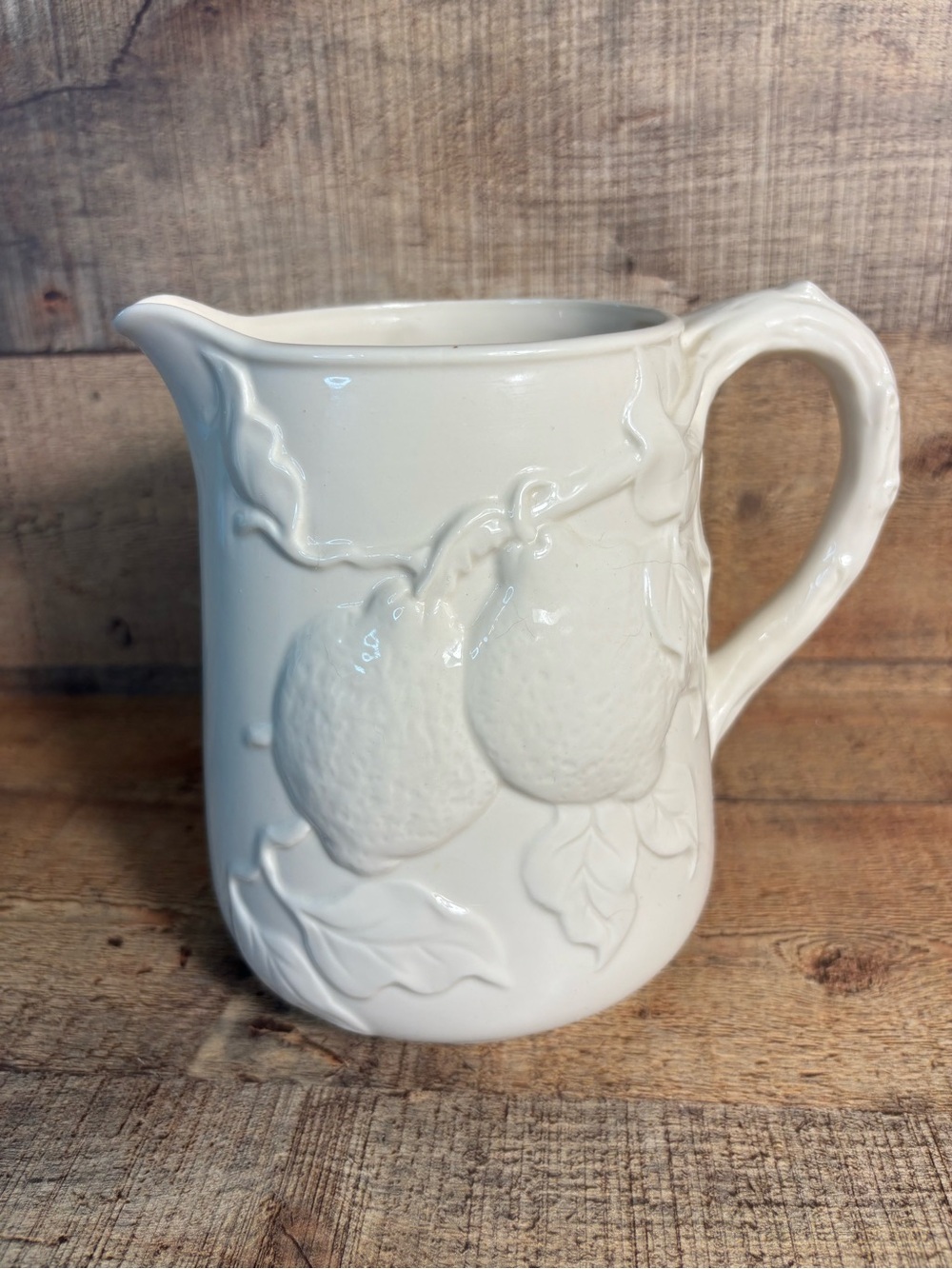 Peppertree Tabletops Pitcher Ivory Ceramic Pottery Embossed Fruit Design 6-3/4"